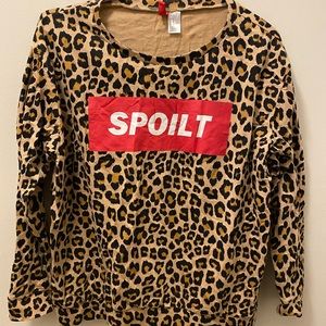 Long sleeve cheetah print shirt.